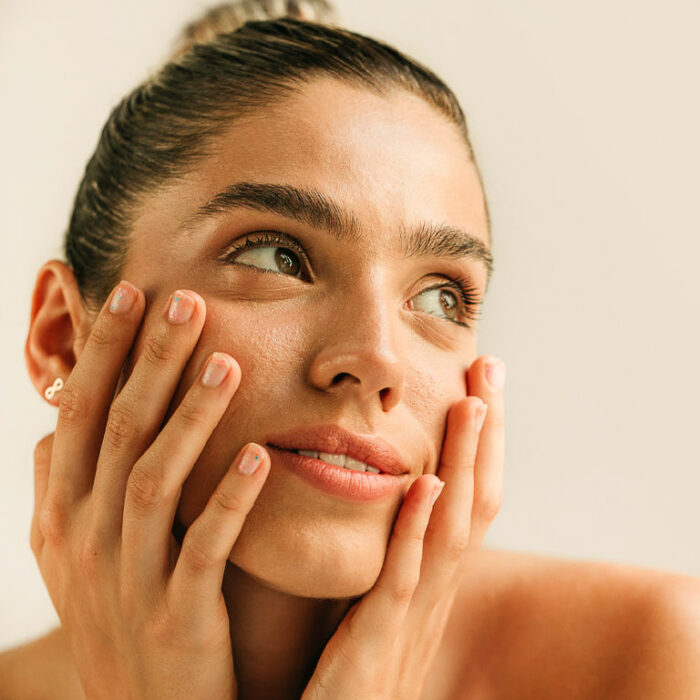 girl with lush and healthy skin with hydrating moisturizer